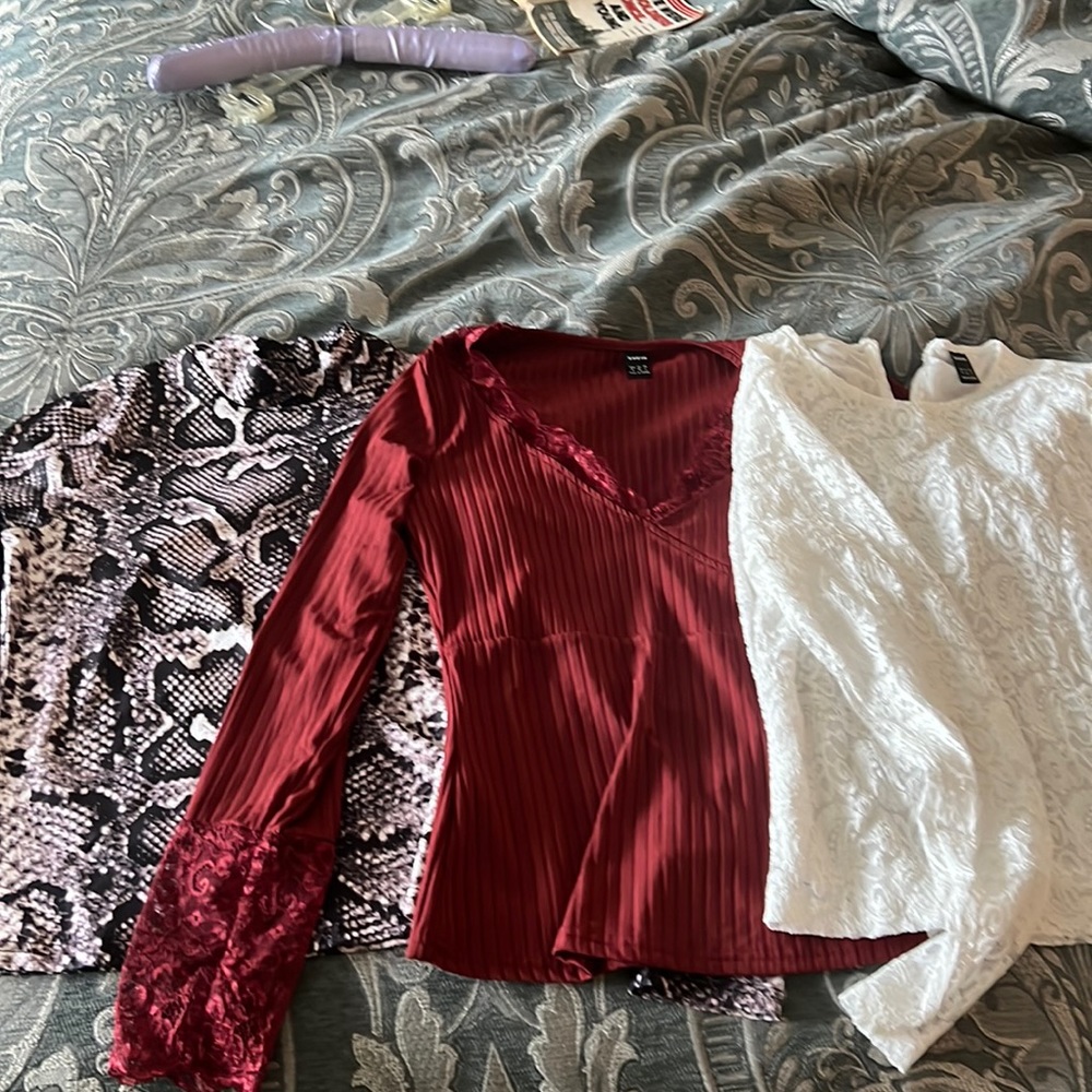 3 tops for less than the price of 1! Never worn. Size medium.